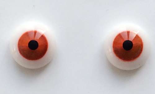 Clear red with red rim. 11 mm. 6.5 euro.