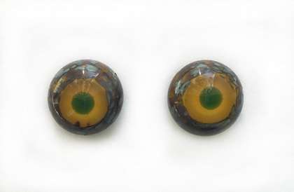 Brown with beige and turquoise spots and yellow iris. 10 mm. 4 euro.