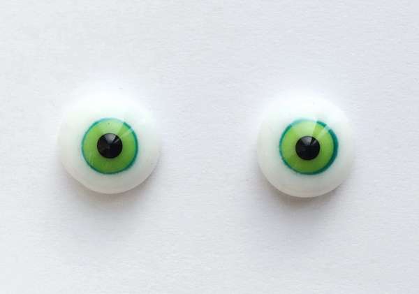 Light green with turquoise rim. 12 mm. 6.5 euro.